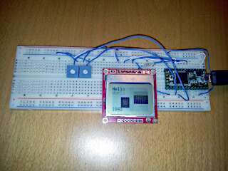 Screen on breadboard displaying all four shades at once